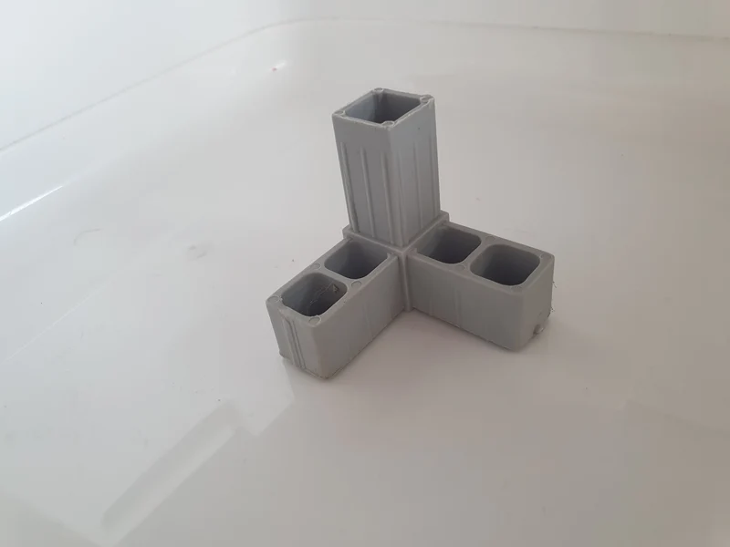 Pièce de raccordement coin volière